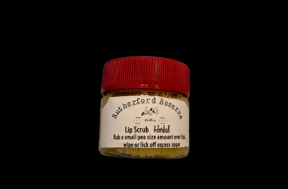 Lip scrub with herbal essential oils